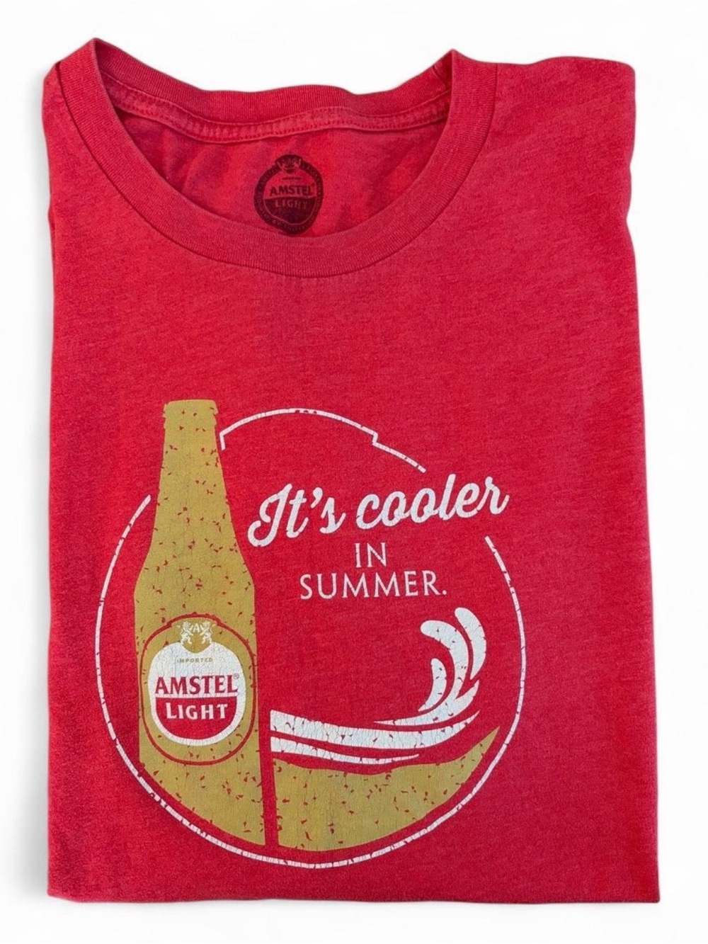 Amstel Light Men’s Sz. L red t-shirt. Features an Amstel light graphic on front.